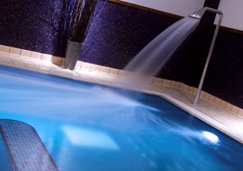 Hydrotherapy pool area with spray water fountain in the spa at The Belfry Hotel