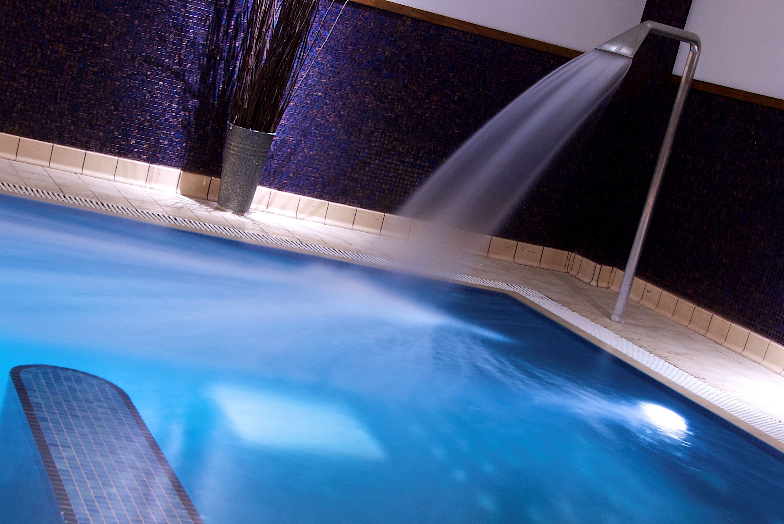 Hydrotherapy pool area with spray water fountain in the spa at The Belfry Hotel
