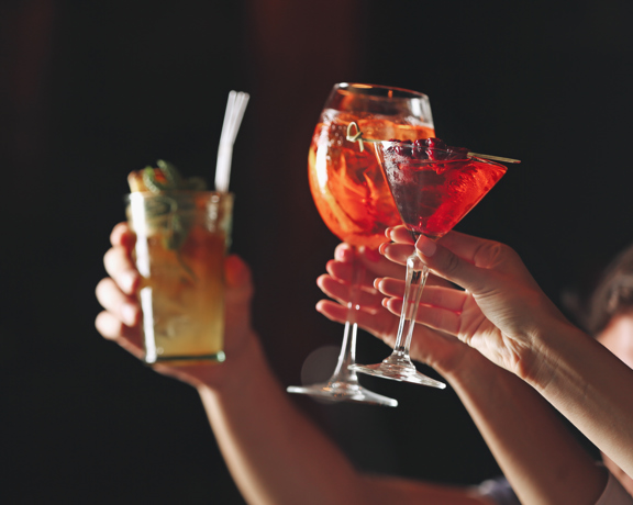 Friends Toasting With Cocktails Bar (1)